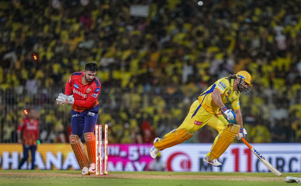 MS Dhoni was run out on the last ball of the 20th over.
