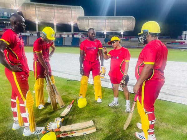 Abhay, a seasoned coach from the Indian domestic circuit, talking to the Uganda players during a training session. Abhay, a seasoned coach from the Indian domestic circuit, talking to the Uganda players during a training session.