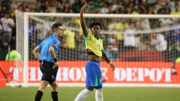 COLLEGE STATION, TEXAS - JUNE 08: Endrick Sousa #9 of Brazil reacts after scoring a goal in extra time against the Mexico during an international friendly at Kyle Field on June 08, 2024 in College Station, Texas. (Photo by Tim Warner/Getty Images)