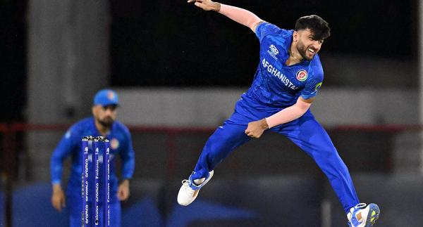 Afghanistan’s Fazalhaq Farooqi in action against West Indies. 