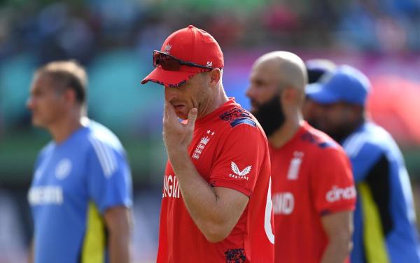 England’s Jos Buttler and his team after the semifinal loss to India. England’s Jos Buttler and his team after the semifinal loss to India.