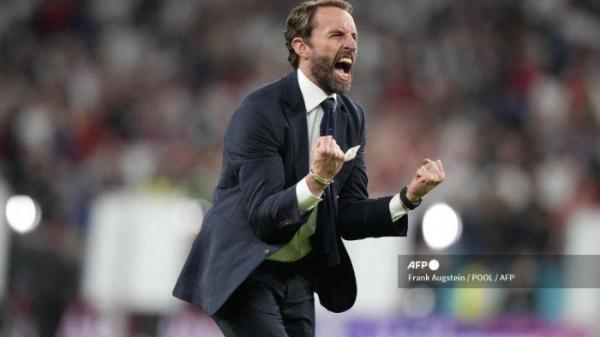 Pelatih Inggris Gareth Southgate merayakan setelah memenangkan pertandingan sepak bola semifinal UEFA EURO 2020 antara Inggris dan Denmark di Stadion Wembley di London pada 7 Juli 2021.