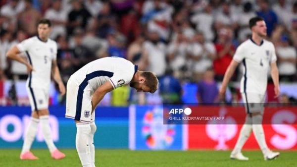 Penyerang Inggris #09 Harry Kane terlihat selama pertandingan sepak bola Grup C UEFA Euro 2024 antara Inggris dan Slovenia di Stadion Cologne di Cologne pada 25 Juni 2024. (Foto oleh Kirill KUDRYAVTSEV / AFP)