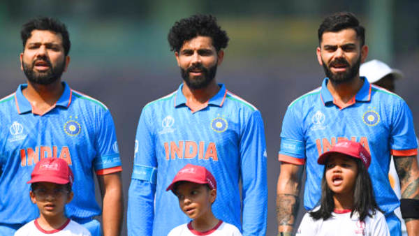 Virat Kohli with Ravindra Jadeja and Rohit Sharma