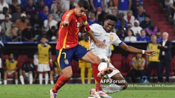Alvaro Morata vs Aurelien Tchouameni di semifinal EURO 2024 antara Spanyol vs Prancis di Munich Football Arena pada 9 Juli 2024 di Munich, Jerman.
