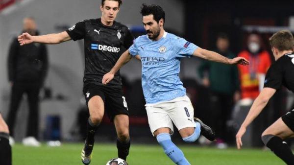Florian Neuhaus dan Ilkay Gundogan di leg kedua babak 16 besar Liga Chamoion Manchester City vs Borussia Monchengladbach di Puskas Arena di Budapest pada 16 Maret 2021.