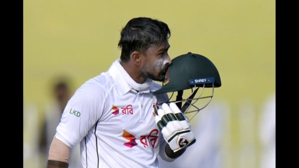 Litton Das kissing his helmet after scoring a hundred against Pakistan 