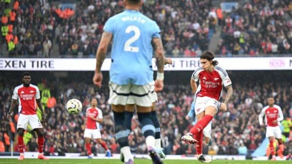 Aksi pemain Arsenal, Riccardo Calafiori saat mencetak gol ke gawang Manchester City pada pekan kelima Liga Inggris, Minggu (22/9/2024) malam WIB.