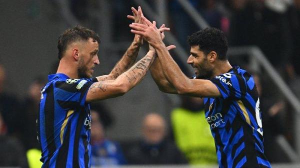 Selebrasi Marko Arnautovic dan Mehdi Taremi ketika mencetak gol, pada pertandignan Liga Champions antara Inter Milan vs Red Star, di Stadion Giuseppe Meazza, Rabu (2/10/2024).