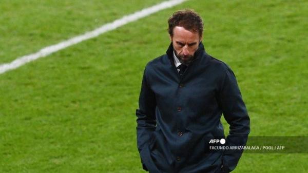 Reaksi pelatih Inggris Gareth Southgate saat pertandingan final sepak bola UEFA EURO 2020 antara Italia dan Inggris di Stadion Wembley di London pada 11 Juli 2021.
FACUNDO ARRIZABALAGA / POOL / AFP