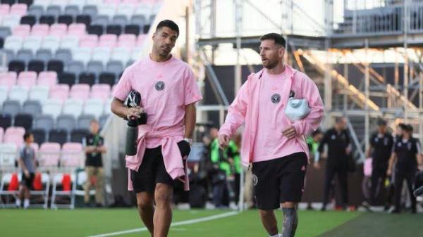 Lionel Messi dan Luis Suárez