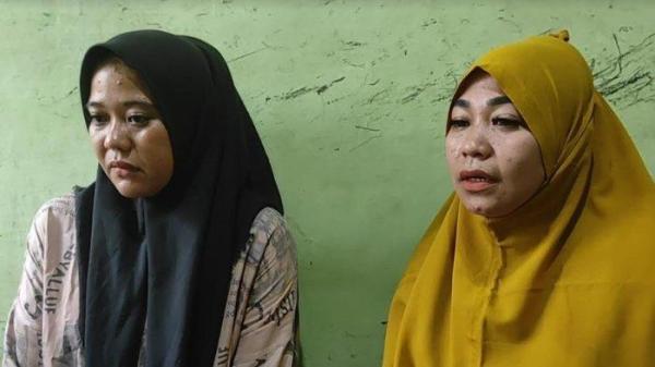 Putri dan Vita, Dua orang kakak korban Ade Nurul Fadilah (19) warga Jalan Mandiri, Kelurahan Sidomukti, Kecamatan Kisaran Barat, Kabupaten Asahan siswi sekolah penerbangan di Kota Medan Meninggal dunia secara tidak wajar. Mengaku, sempat ada cekcok dengan seseorang di sekolah yang beda Asrama. (Alif Alqadri Harahap/tribun-medan.com)