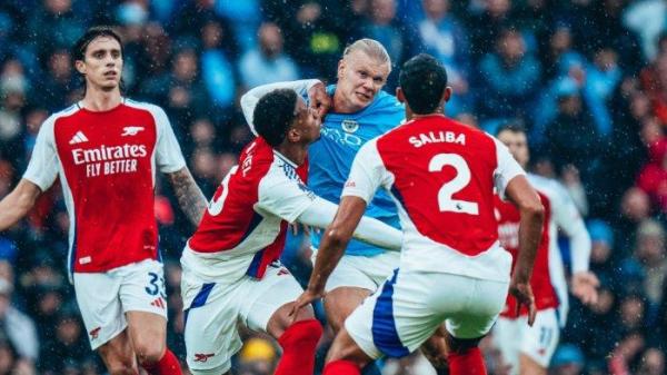 Aksi penyerang Manchester City, Erling Haaland saat melawan Arsenal pada pekan kelima Liga Inggris, Minggu (22/9/2024) malam WIB.