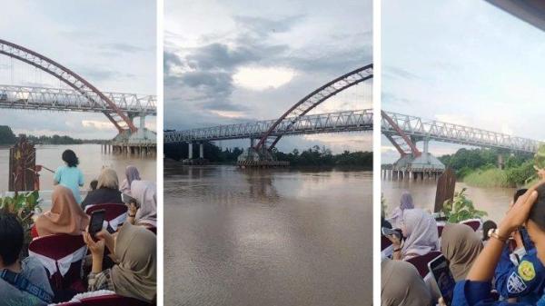 Kolase wisata Palangkaraya, menyusuri Sungai Kahayan menggunakan kapal besar diikuti banyak pengunjung.