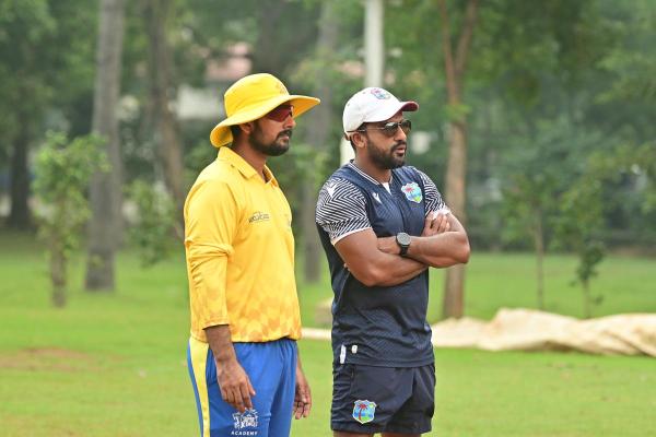 West Indies Academy head coach Ramesh Subasinghe (R) with CSK Academy coach Sriram Krishnamurthy.