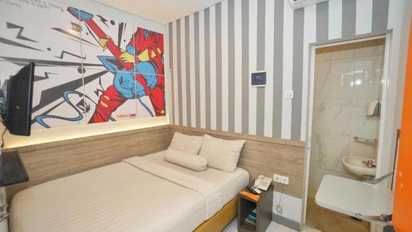Ilustrasi salah satu kamar yang ada di Front One Cabin Solo