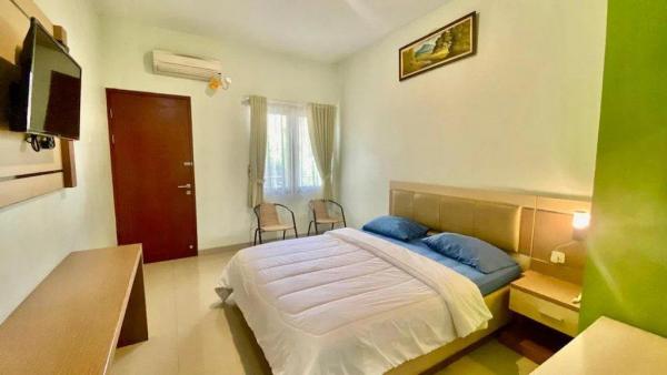 Ilustrasi Salah Satu Tipe Kamar yang ada di Mawar Indah Hotel near Stasiun Balapan Solo Mitra RedDoorz