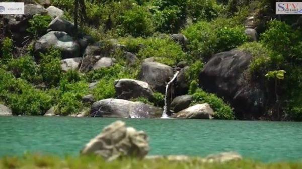 Kolam pemandian alam di Kampung Bambar