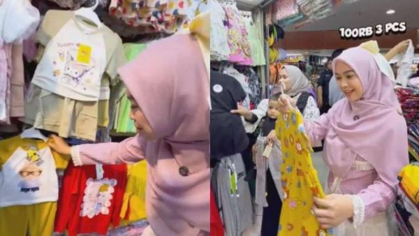 Ria Ricis kepergok membelikan baju untuk putrinya, Moana, di sebuah pasar.