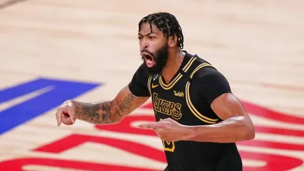 Los Angeles Lakers forward Anthony Davis celebrated during the second half in Game 5 of basketball's NBA Finals against the Miami Heat Friday, Oct. 9, 2020, in Lake Buena Vista, Fla. (AP Photo/Mark J. Terrill)