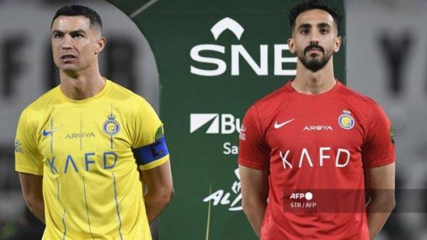 CRISTIANO RONALDO BERFOTO - Pemain Al Nassr, Cristiano Ronaldo dan Nawaf Al-Aqidi saat pertandingan sepak bola menghadapi Al Shabab di Stadion Klub Al-Shabab pada 11 Desember 2023. Cristiano Ronaldo punya rekor gol mentereng ke gawang Al Wehda yang akan menjadi lawan Al Nassr di pekan ke-22 Liga Arab Saudi, Selasa (25/2/2025). (Arsip foto Desember 2023).