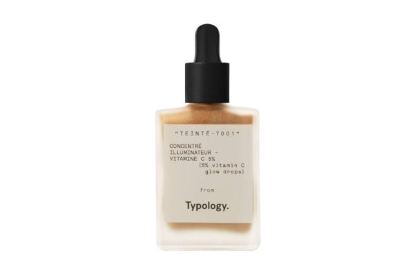 A bottle of liquid with a dropper