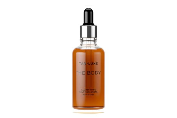 A brown liquid in a Tanluxe bottle
