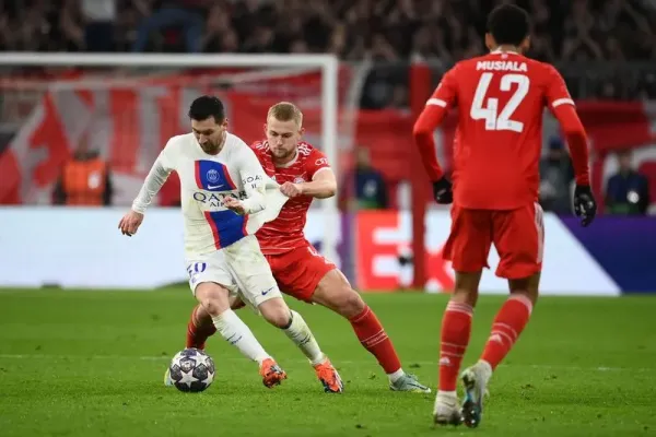 Paris Saint-Germain's Argentine forward Lionel Messi (L) and Bayern Munich's Dutch defender Matthijs de Ligt vie for the ball during the UEFA Champions League round of 16, 2nd-leg football match FC Bayern Munich v Paris Saint-Germain FC in Munich, southern Germany, on March 8, 2023. (Photo by FRANCK FIFE / AFP) (Photo by FRANCK FIFE/AFP via Getty Images)