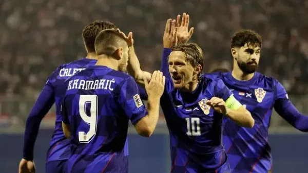 ZAGREB, CROATIA - OCTOBER 12: Andrej Kramaric of Croatia celebrates scoring his team's second goal with teammate Luka Modric during the UEFA Nations League 2024/25 League A Group A1 match between Croatia and Scotland at Stadion Maksimir on October 12, 2024 in Zagreb, Croatia. (Photo by Srdjan Stevanovic/Getty Images)