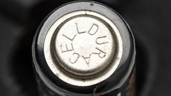 Duracell engraved onto the top of a battery cell