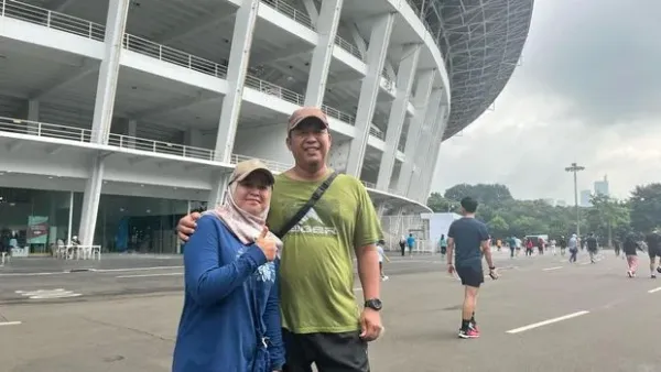 Kawasan ring road Stadion Utama Gelora Bung Karno (SUGBK), Jakarta, diramaikan warga yang berolahraga pagi, Kamis (3/4/2025). <div class=