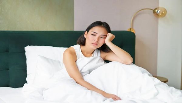 portrait sad young woman waking up feeling bad wants sleep wakes early morning looking lazy