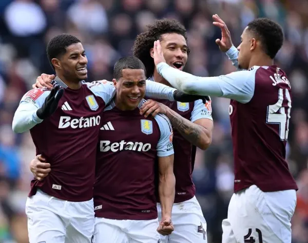 PRESTON, ENGLAND - MARCH 30: Marcus Rashford of Aston Villa celebrates scoring his team's second goal from the penalty spot with teammates Youri Tielemans, Boubacar Kamara and Jacob Ramsey (obscured) during the Emirates FA Cup Quarter Final match between Preston North End and Aston Villa at Deepdale on March 30, 2025 in Preston, England. (Photo by Stu Forster/Getty Images)