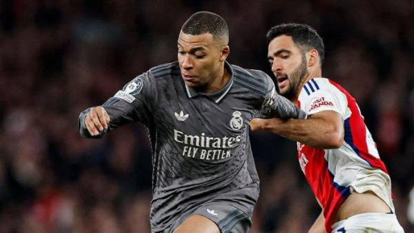 MBAPPE DIJAGA - Pemain Real Madrid Kylian Mbappe dalam penjagaan ketat pemain Arsenal pada pertandingan leg pertama perempat final Liga Champions 2024/2025 di Stadion Emirates, Rabu (9/4/2025). (Instagram Real Madrid - 9/4/2025)
