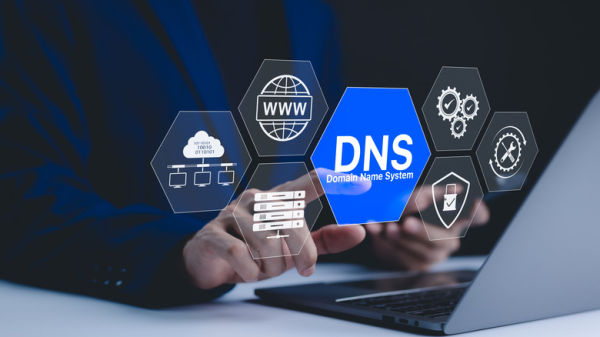 Man using laptop with virtual icons  to DNS.