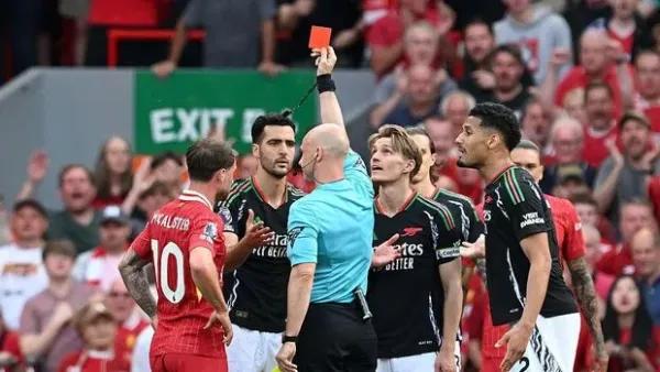LIVERPOOL, ENGLAND - MAY 11: Mikel Merino of Arsenal receives a red card from referee Anthony Taylor during the Premier League match between Liverpool FC and Arsenal FC at Anfield on May 11, 2025 in Liverpool, England. <div class=