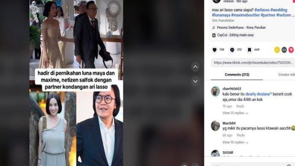 Ari Lasso menggandeng tangan seorang wanita yang mengenakan dress hendak masuk