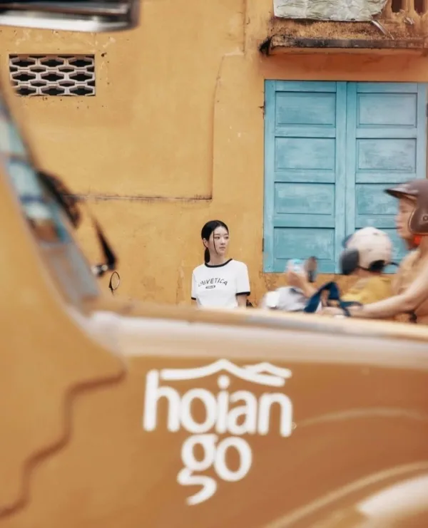 Actress Seo Ye Ji poses with ancient yellow walls during her trip to Hoi An, May 2025. Photo courtesy of her Instagram