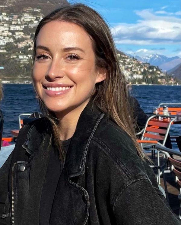 Headshot of Caitlin Trask wearing a black jacket.