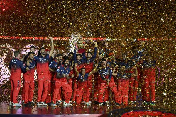 Royal Challengers Bengaluru Captain Rajat Patidar lifts the IPL Trophy. Royal Challengers Bengaluru Captain Rajat Patidar lifts the IPL Trophy.