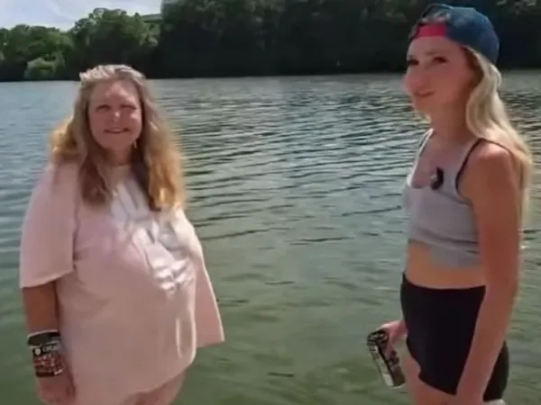 Momen Natalie Reynolds saat membuat konten prank dengan seorang gelandangan. Dia menyuruh wanita tersebut menceburkan diri ke Danau Lady Bierd, Austin, Texas.