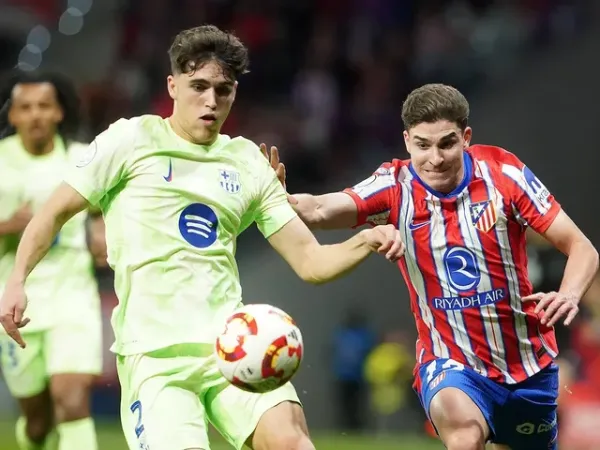 Barcelona's Pau Cubarsi in action against Atletico Madrid's Julian Alvarez on April 2, 2025