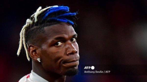 Gambar yang diambil pada 29 September 2021 menunjukkan gelandang Manchester United asal Prancis Paul Pogba di stadion Old Trafford di Manchester. Gelandang Juventus dan Prancis Paul Pogba untuk sementara diskors setelah pengawasan doping mendeteksi zat terlarang testosteron, kata otoritas anti-doping Italia (NADO) kepada AFP pada 11 September 2023.