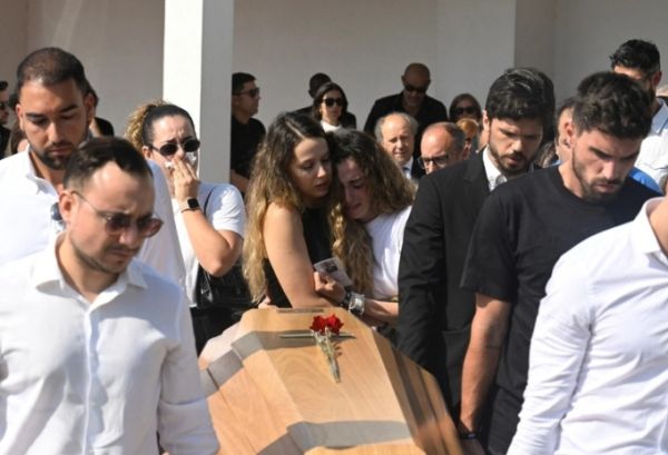 Diogo Jotas wife Rute Cardoso (C,R) and her sister react as former teammates carry the coffin during the funerals of Liverpools Portuguese forward Diogo Jota and his brother Andre Silva at the Mother Church of Gondomar, on the outskirts of Porto, on July 5, 2025. Photo by AFP