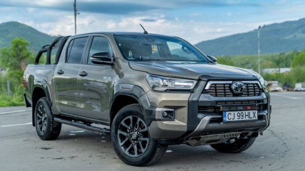A Toyota Hilux Legend parked on the side of the road