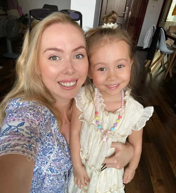 Neneh Ngo – a teacher in Hanoi – poses for a photo next to her daughter. Photo courtesy of Neneh Ngo