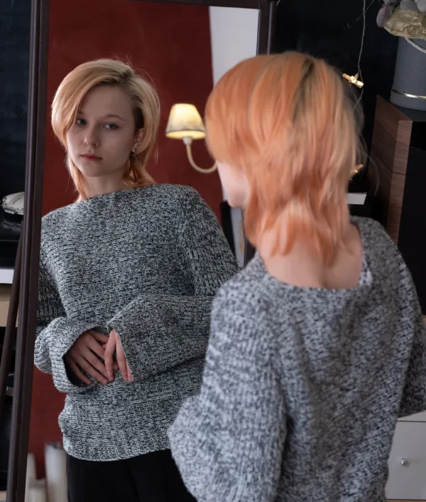 young woman thinking about her appearance negatively more common realize