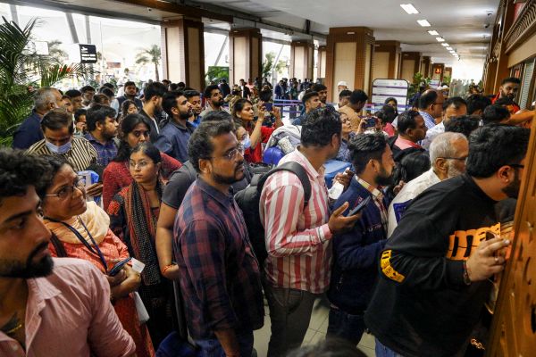 People stood in line for hours at Ahmedabad airport.