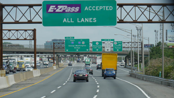 Highway drivers approaching toll bridge in New York