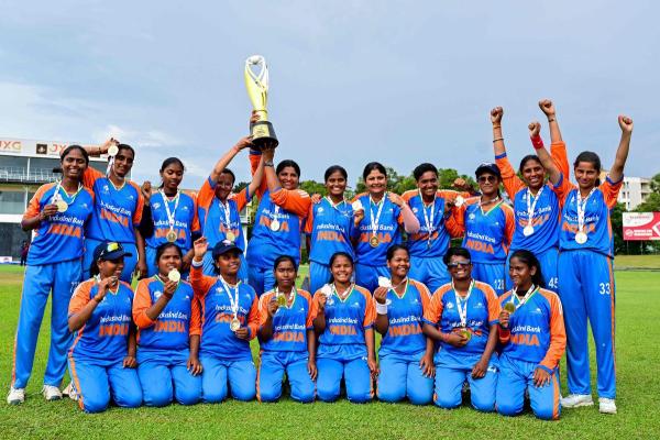 India's players pose with the trophy after winning against Nepal at the Blind Women's Twenty20 World Cup 2025 final match in the P. Saravanamuttu Stadium in Colombo.